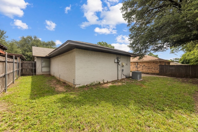 1124 Janell Dr, Irving, TX 75062 - rear view of house featuring brick siding and a fenced backyard