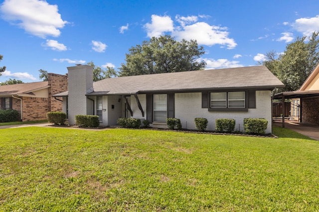 1124 Janell Dr, Irving, TX 75062 - ranch-style home featuring brick siding, a front yard, and a shingled roof