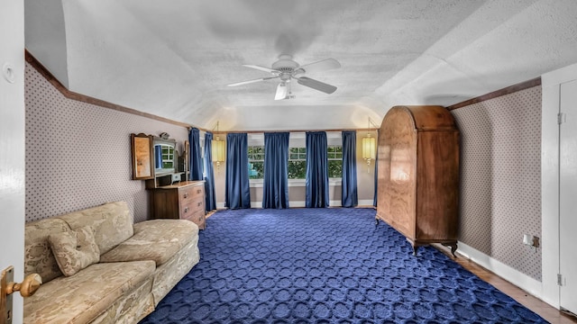 305 E Lee Ave, Weatherford, TX 76086 - living room with wallpapered walls, a ceiling fan, and a textured ceiling