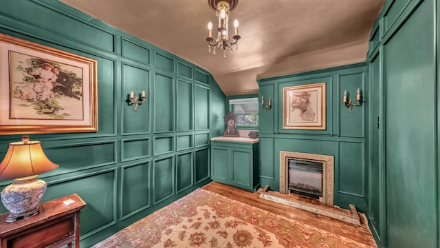 305 E Lee Ave, Weatherford, TX 76086 - mudroom featuring a decorative wall, a chandelier, and a fireplace