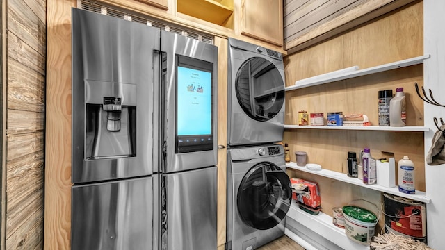 305 E Lee Ave, Weatherford, TX 76086 - washroom featuring stacked washer and clothes dryer