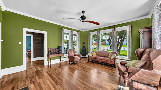 305 E Lee Ave, Weatherford, TX 76086 - sitting room featuring wood finished floors, crown molding, and ceiling fan