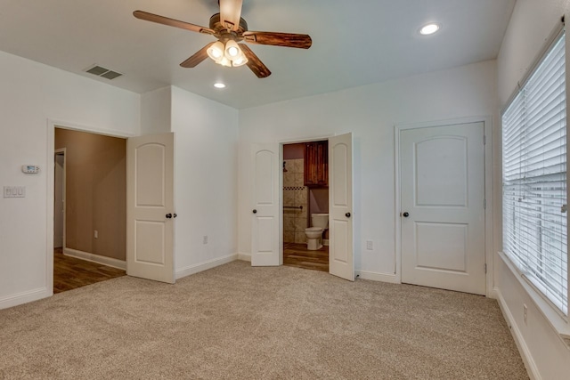 924 Via Barcelona, Mesquite, TX 75150 - unfurnished bedroom featuring light carpet, ensuite bath, recessed lighting, and a ceiling fan