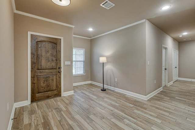 924 Via Barcelona, Mesquite, TX 75150 - entryway with light wood-style flooring, ornamental molding, and recessed lighting