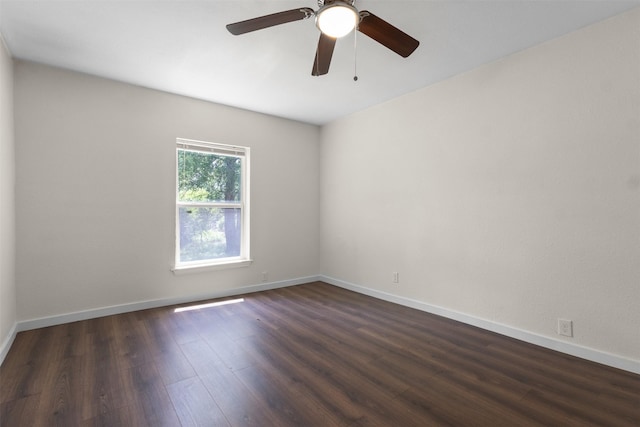 431 W Texas St, Denison, TX 75020 - unfurnished room featuring dark wood-style flooring and a ceiling fan