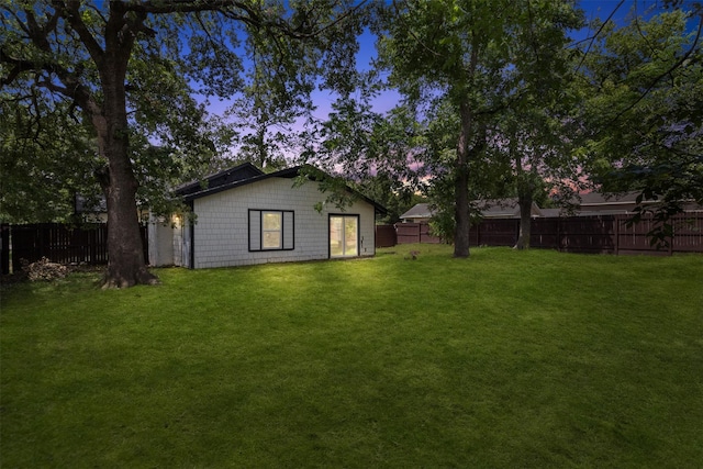 431 W Texas St, Denison, TX 75020 - rear view of house featuring a fenced backyard