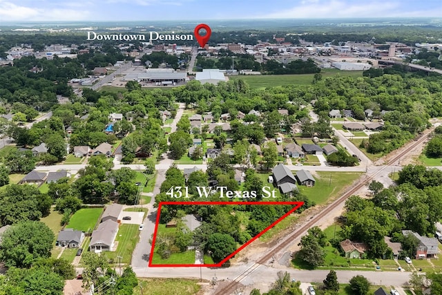 431 W Texas St, Denison, TX 75020 - aerial view of residential area featuring property parcel outlined