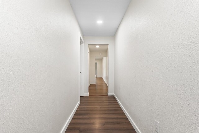 431 W Texas St, Denison, TX 75020 - hallway with recessed lighting and dark wood-style floors