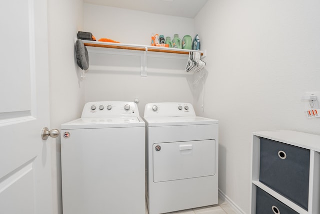 3216 Everly Dr, Fate, TX 75189 - washroom with washing machine and dryer and light tile patterned flooring