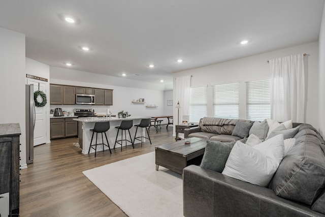 3216 Everly Dr, Fate, TX 75189 - living room with recessed lighting and wood finished floors