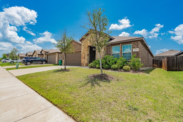 3216 Everly Dr, Fate, TX 75189 - view of front facade featuring brick siding, an attached garage, and concrete driveway