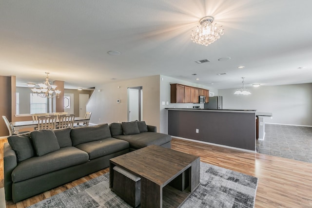2153 Valley Forge Trl, Fort Worth, TX 76177 - living area with a chandelier and wood finished floors
