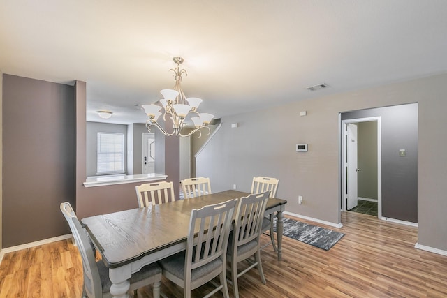 2153 Valley Forge Trl, Fort Worth, TX 76177 - dining room featuring a chandelier and light wood-style flooring