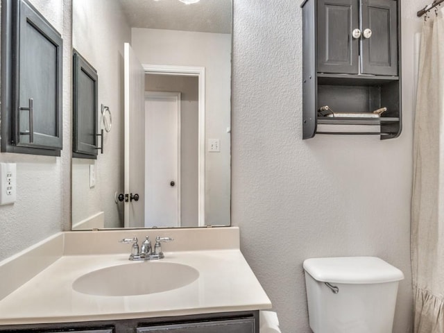 116 Hackberry Trl, Forney, TX 75126 - bathroom featuring vanity and a textured wall