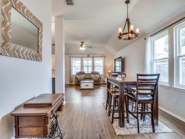 116 Hackberry Trl, Forney, TX 75126 - dining room featuring wood finished floors, ceiling fan, lofted ceiling, and a chandelier