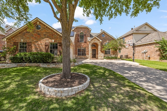 3912 Appleton Ln, Flower Mound, TX 75022 - traditional-style home with brick siding and a front lawn
