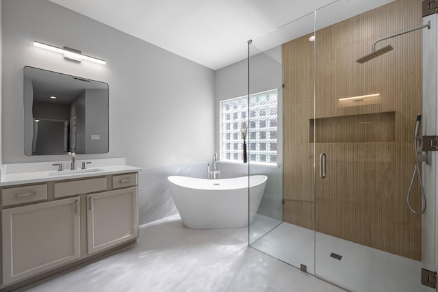 3912 Appleton Ln, Flower Mound, TX 75022 - full bath featuring a shower stall, vanity, a freestanding bath, and tile patterned flooring