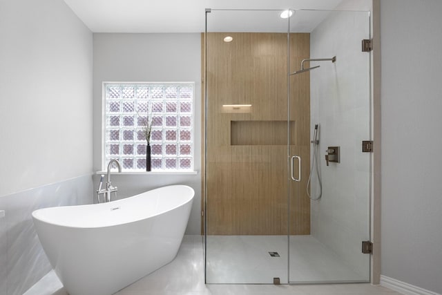 3912 Appleton Ln, Flower Mound, TX 75022 - full bathroom featuring a freestanding tub and a stall shower