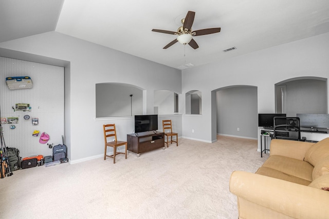3912 Appleton Ln, Flower Mound, TX 75022 - living room featuring ceiling fan, light colored carpet, arched walkways, and lofted ceiling