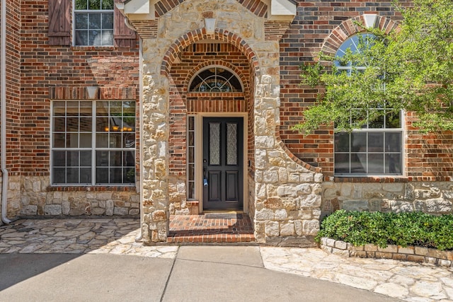 3912 Appleton Ln, Flower Mound, TX 75022 - view of exterior entry with stone siding and brick siding