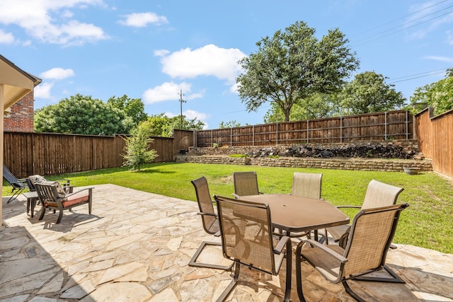 3912 Appleton Ln, Flower Mound, TX 75022 - fenced backyard with outdoor dining space and a patio area