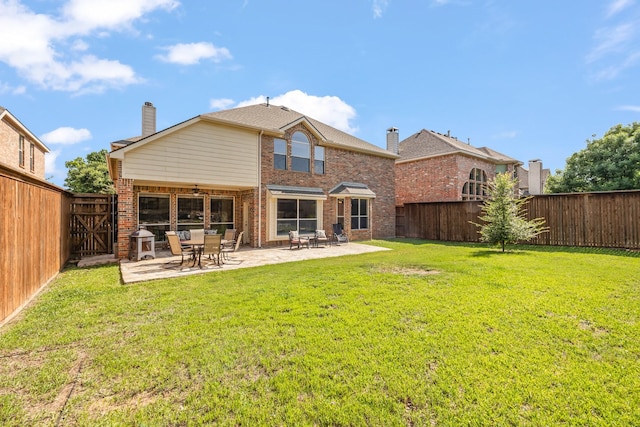 3912 Appleton Ln, Flower Mound, TX 75022 - back of property with brick siding, a fenced backyard, a patio area, and a chimney