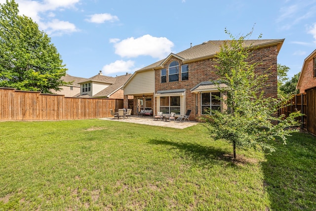 3912 Appleton Ln, Flower Mound, TX 75022 - back of house featuring brick siding, a patio, and a fenced backyard