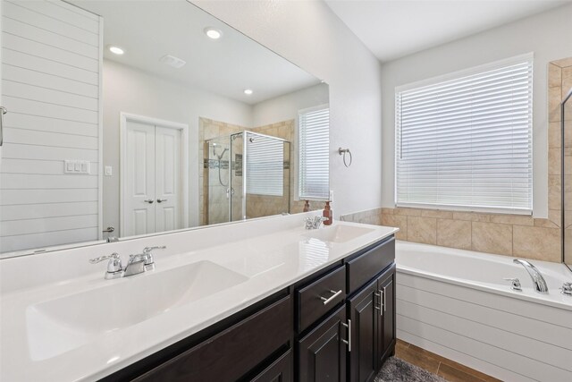 1083 Admiral Dr, Azle, TX 76020 - bathroom with a shower stall, a garden tub, double vanity, and recessed lighting