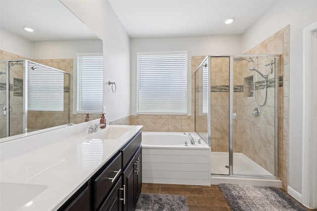 1083 Admiral Dr, Azle, TX 76020 - bathroom with vanity, a bath, a stall shower, and recessed lighting