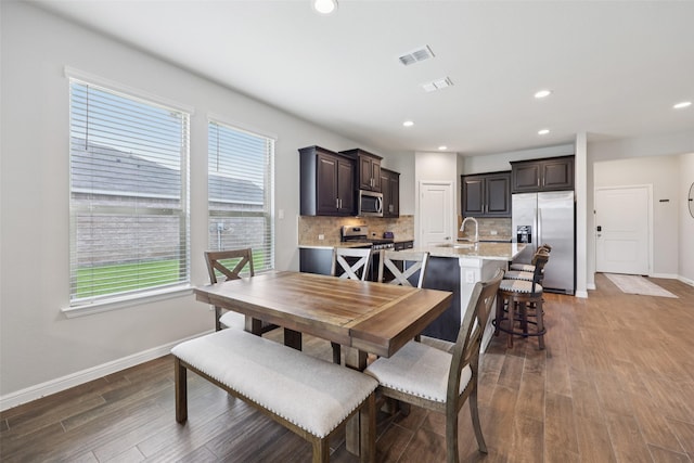 1083 Admiral Dr, Azle, TX 76020 - dining area with dark wood finished floors and recessed lighting
