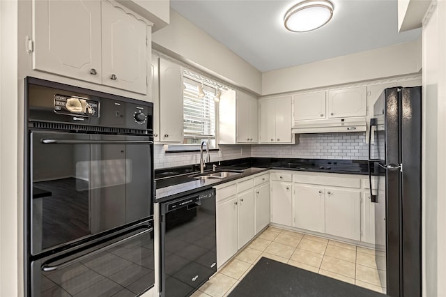 5835 E University Blvd Unit D, Dallas, TX 75206 - kitchen featuring black appliances, dark countertops, white cabinetry, and decorative backsplash