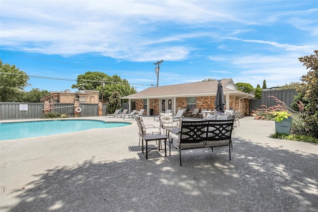 5835 E University Blvd Unit D, Dallas, TX 75206 - community pool featuring a patio area