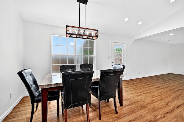 231 Juniper Dr, Pottsboro, TX 75076 - dining room with recessed lighting, wood finished floors, and lofted ceiling