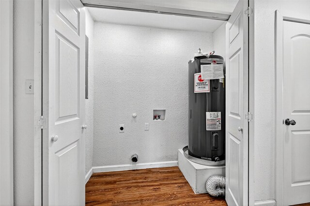231 Juniper Dr, Pottsboro, TX 75076 - laundry area featuring water heater, wood finished floors, hookup for an electric dryer, and washer hookup