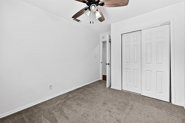 231 Juniper Dr, Pottsboro, TX 75076 - unfurnished bedroom featuring carpet flooring, a closet, and ceiling fan