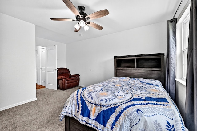 231 Juniper Dr, Pottsboro, TX 75076 - carpeted bedroom featuring baseboards and a ceiling fan