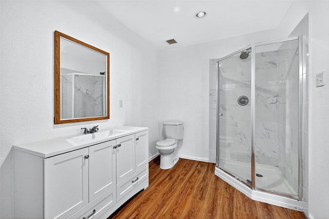 231 Juniper Dr, Pottsboro, TX 75076 - bathroom featuring a marble finish shower, vanity, and wood finished floors