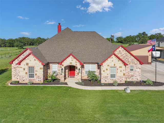 301 Aviara Ct, Poolville, TX 76487 - french country inspired facade with a front yard, roof with shingles, a chimney, and a garage