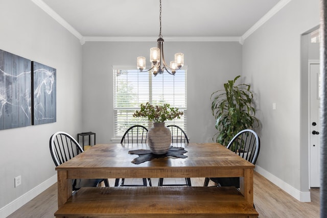 301 Aviara Ct, Poolville, TX 76487 - dining room with a chandelier, light wood-style flooring, and ornamental molding