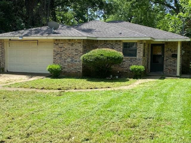126 Oak St, Lancaster, TX 75146 - ranch-style house featuring an attached garage, concrete driveway, a front lawn, brick siding, and roof with shingles