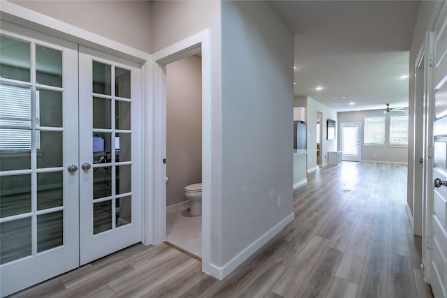 2208 Wexford Way, Forney, TX 75126 - corridor with french doors, light wood-style flooring, and recessed lighting