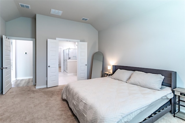 2208 Wexford Way, Forney, TX 75126 - bedroom with vaulted ceiling, light colored carpet, and ensuite bathroom