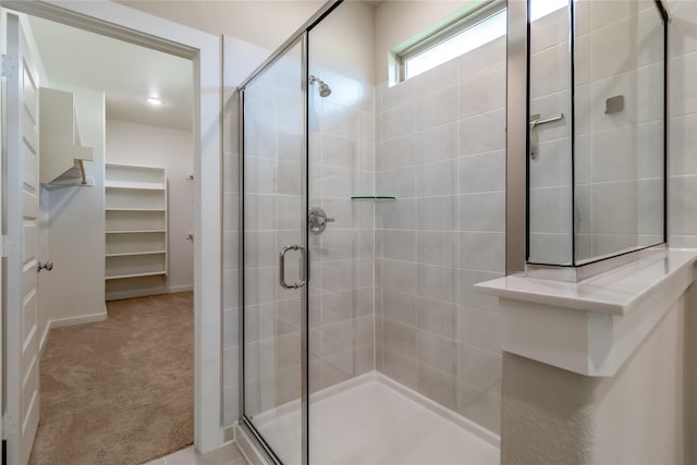 2208 Wexford Way, Forney, TX 75126 - bathroom featuring a shower stall and a walk in closet
