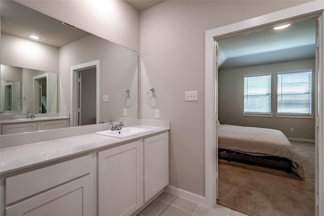 2208 Wexford Way, Forney, TX 75126 - bathroom featuring vanity, tile patterned flooring, and connected bathroom
