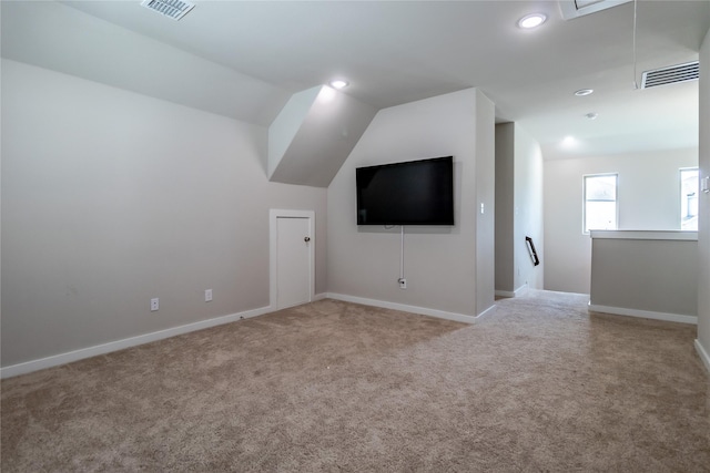 2208 Wexford Way, Forney, TX 75126 - additional living space with attic access, carpet flooring, lofted ceiling, and recessed lighting