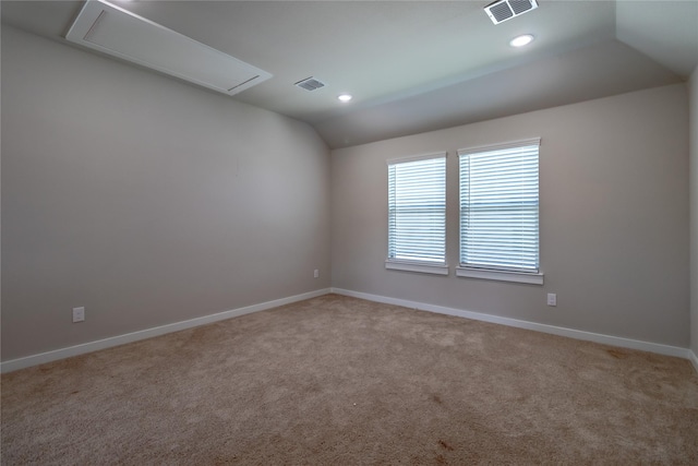 2208 Wexford Way, Forney, TX 75126 - spare room with attic access, lofted ceiling, light carpet, and recessed lighting