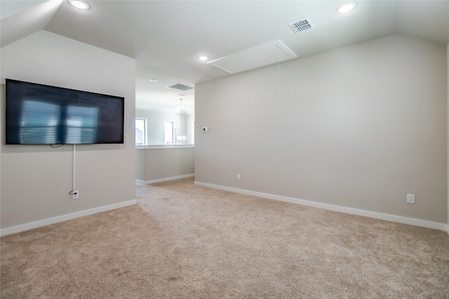 2208 Wexford Way, Forney, TX 75126 - spare room featuring attic access, lofted ceiling, carpet, and recessed lighting