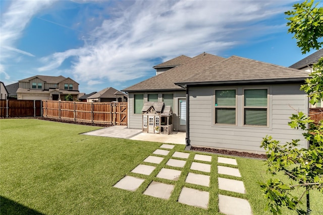 2208 Wexford Way, Forney, TX 75126 - rear view of property with roof with shingles, a patio area, and a fenced backyard