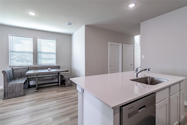 2208 Wexford Way, Forney, TX 75126 - kitchen featuring dishwasher, white cabinetry, light countertops, light wood-style floors, and recessed lighting