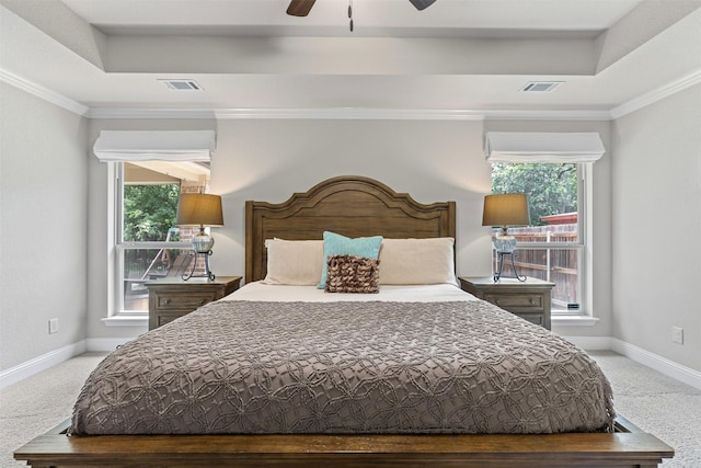 301 Prairie Oak Ct, Burleson, TX 76028 - carpeted bedroom featuring a tray ceiling, multiple windows, crown molding, and ceiling fan